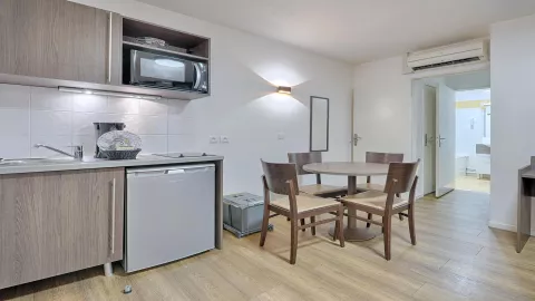 Apparthotel Paris Quai de Marne Vacancéole 2P4 sejour coin repas