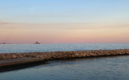 Coucher de soleil sur la plage de Cagnes-sur-Mer. Crédit photo : Mélissa Perrot-Minnot